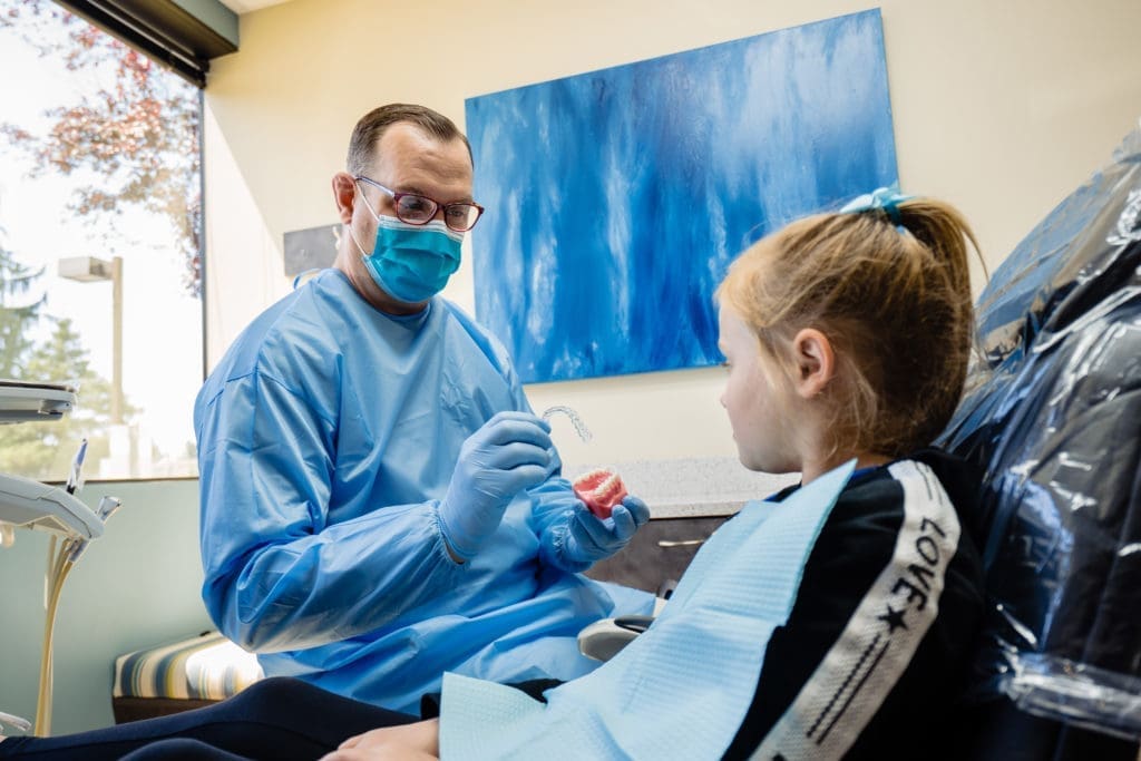 Dr. Troy with Child Patient